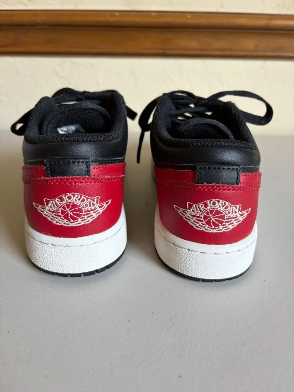 Nike Air Jordan 1 Low Grade Banned Black Varsity Red Iconic Wings Logo 553560-06